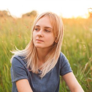 Young woman thinking about her ultrasound results and pregnancy